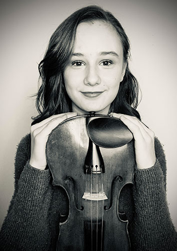 Black and white image of violinist Anna Stube, Young Musician Extraordinaire